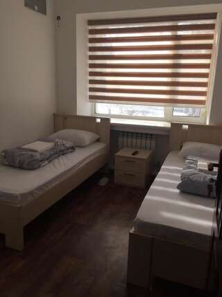 Мини-отель Crazy Horse Алматы Двухместный номер с 2 отдельными кроватями и общей ванной комнатой-2